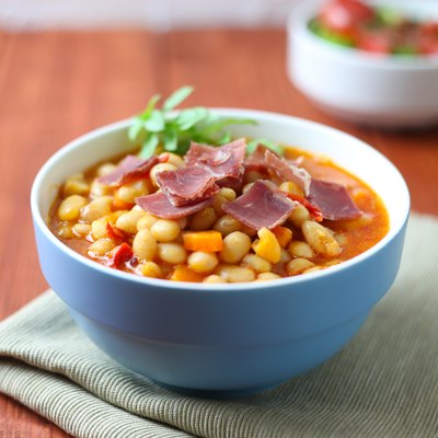 Bean soup with bacon and salad