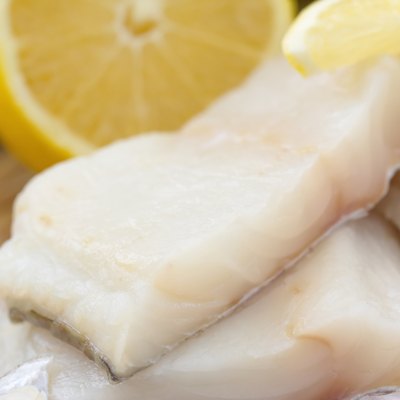 Raw fish with vegetables, lemon and seasonings