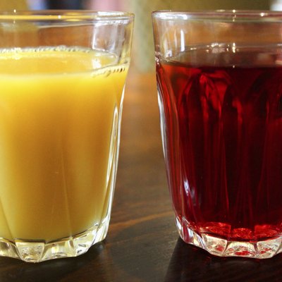 Image of glasses of orange juice and cranberry juice
