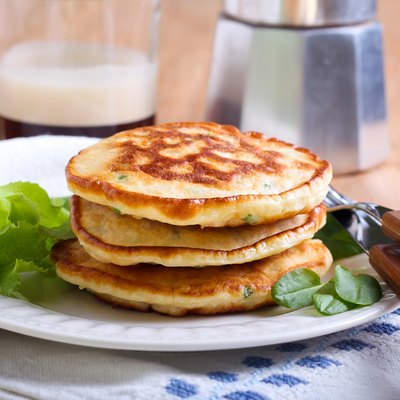 Pile of sweetcorn and herb pancakes