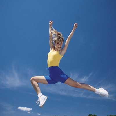 Cheerleader leaping in air