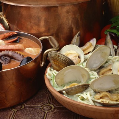 Seafood stew with linguine and clams
