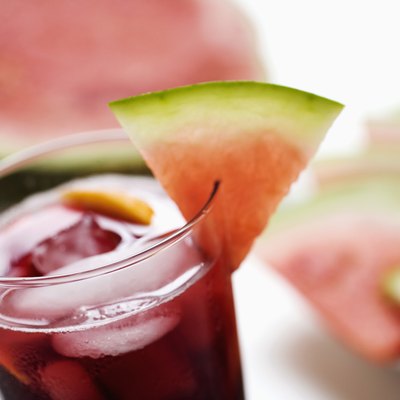 Glass of juice with watermelon slices, close-up