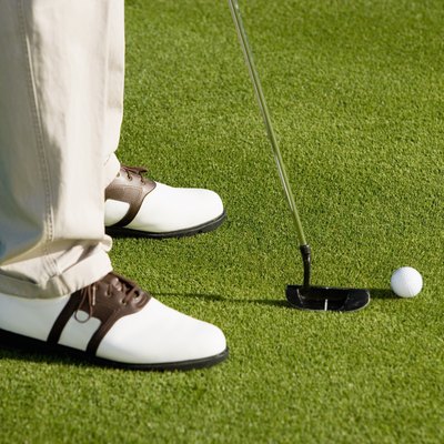 Golfer Preparing to Putt for Par