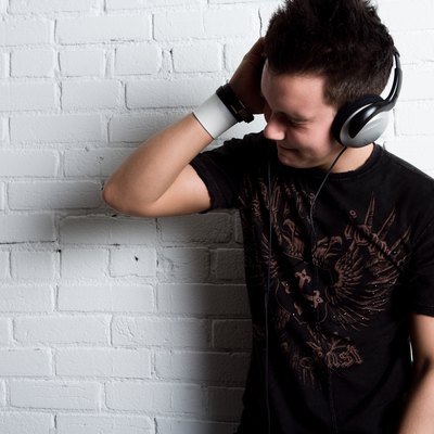 Boy listening to music on headphones