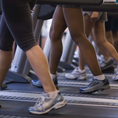 People on treadmills in gym