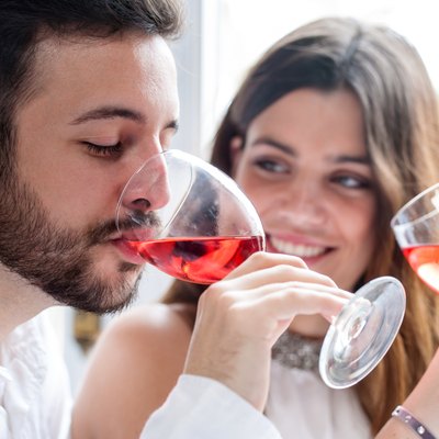 Couple enjoying wine tasting.