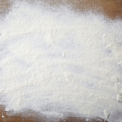 white flour on wooden table