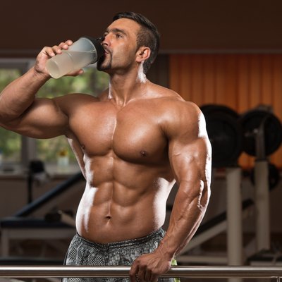 Bodybuilder Drinking Water From Shaker