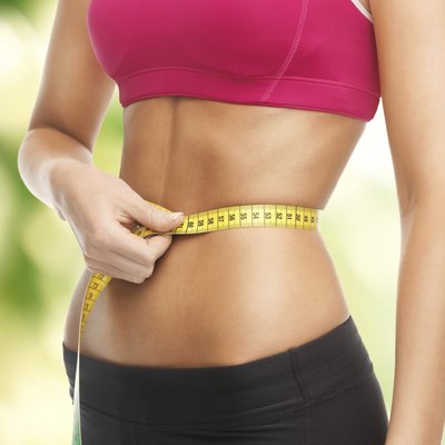 trained belly with measuring tape