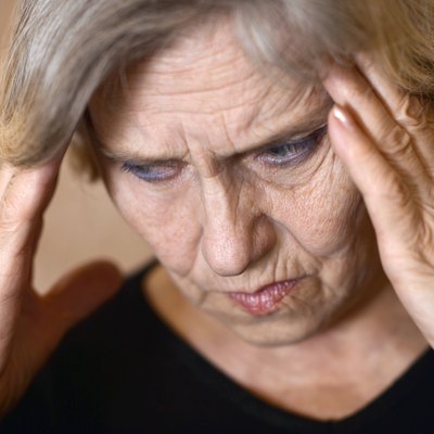 older woman with a headache