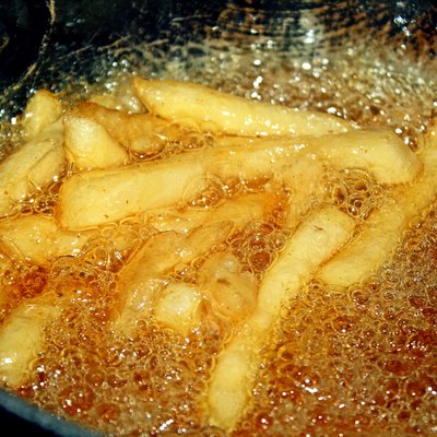 French Fries Cooking In Deep Fryer