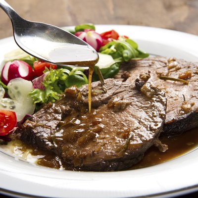 beef garnished with fresh salad