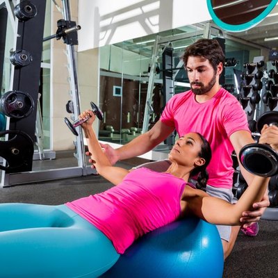 Dumbbell fit ball fly chest flies opening arms workout and personal trainer at gym