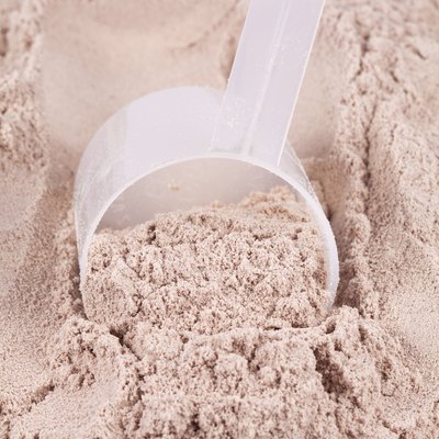 Scoop of chocolate whey isolate protein