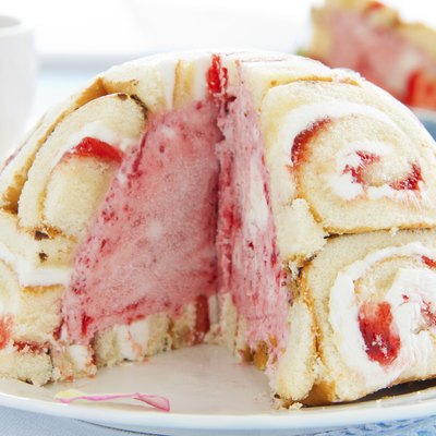 Cake "Charlotte royale" with ice cream and Swiss rolls.