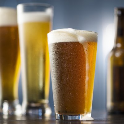 Beer glasses and bottles in enironment