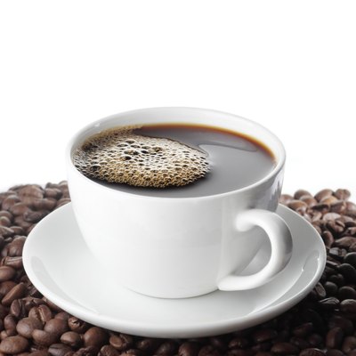 Coffee cup and beans