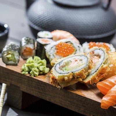 Closeup of fresh sushi on wooden board