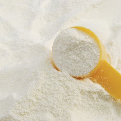 powder milk and yellow spoon