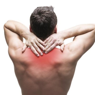 Pain in the neck. Man with backache. Muscular male body. Isolated on white background with red dot