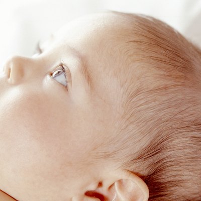 Baby (3-6 months) lying, close-up