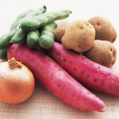 Closed Up Image of Some Red Japanese Potatoes, an Onion, Potatoes and Broad Beans, High Angle View, Differential Focus