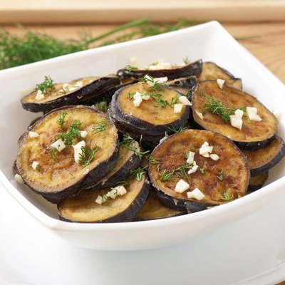 Platter of grilled eggplant with garlic and dill