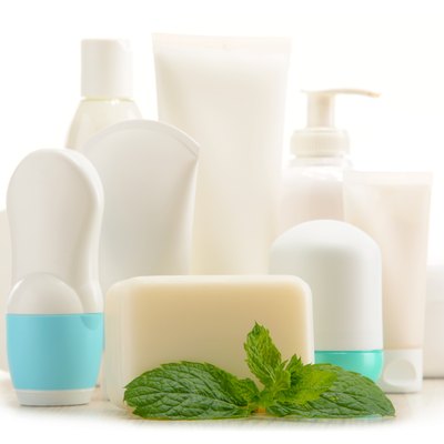 Composition with containers of body care and beauty products