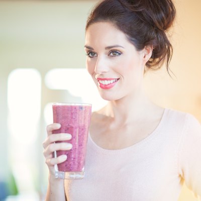 Drinking Fresh Berry Smoothie