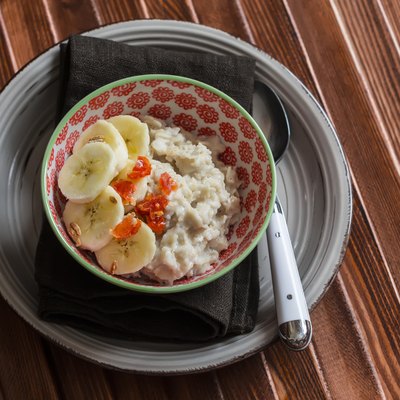 Oatmeal with banana and dried apricots. Healthy Breakfast