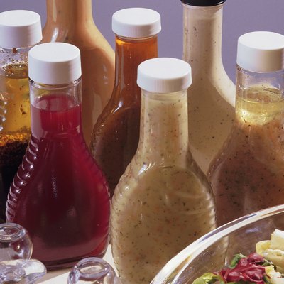 Salad with assorted bottles of dressing