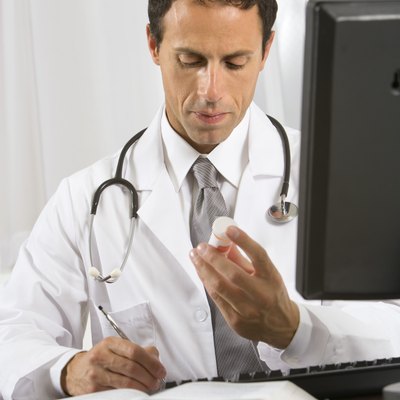 Doctor writing prescription
