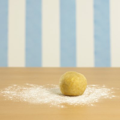 Ball of dough on flour