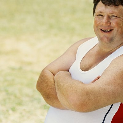 portrait of a mid adult man with his arms crossed