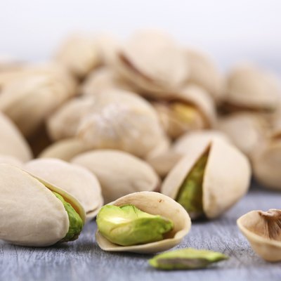 Pistachio nuts on table close up