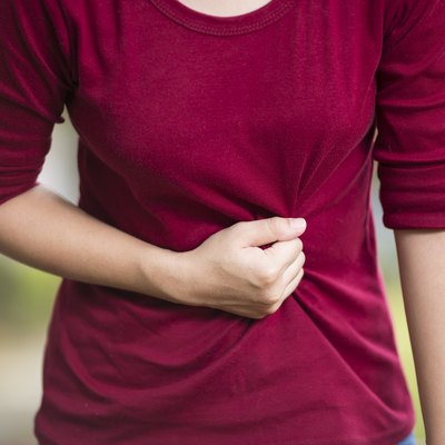Woman Has Stomach Ache at Park