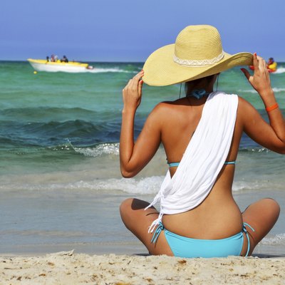Young woman on the mediterranean beach