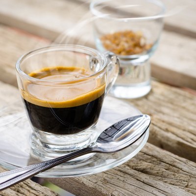 Espresso coffee cup on wooden table