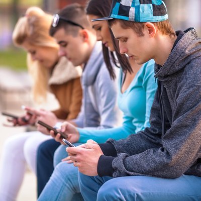 Teenagers Using Mobile Phones