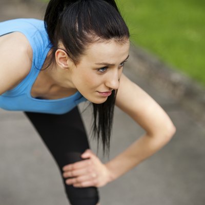 Tired woman after jogging