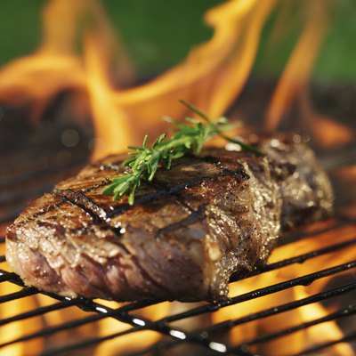 steak barbecue with flames