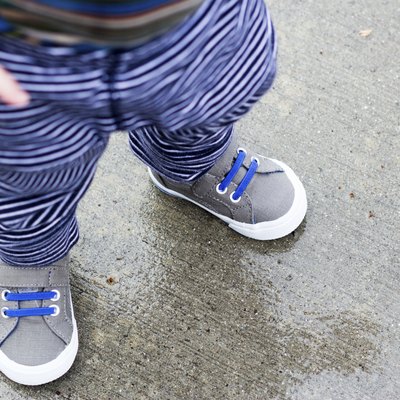 Little Boy Walking in the Rain
