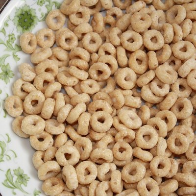 Dry wholegrain cheerios in a cereal bowl