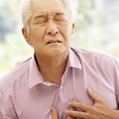 Senior Asian man with chest pain