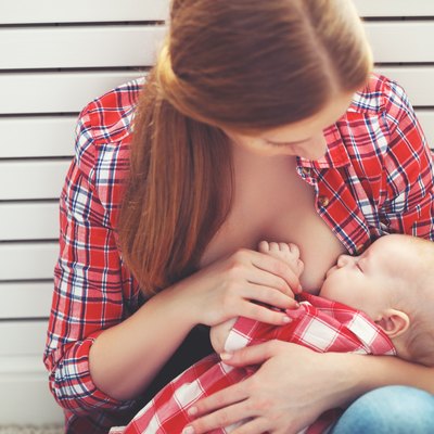 breastfeeding. mother breast feeding baby