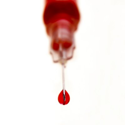 Syringe with blood