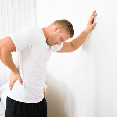 Young Man Having Pain In His Back
