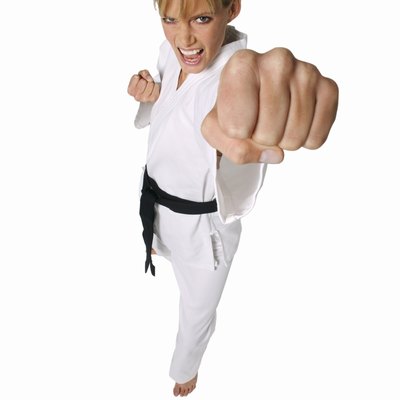 elevated view of a woman wearing karate clothing