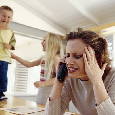 Stressed woman on telephone